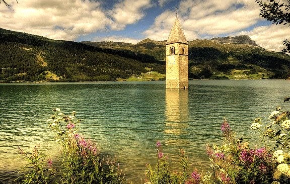 by Wolfgang Staudt on Flickr.Lago di Resia  is an artificial lake located in the western portion of South Tyrol, Italy.