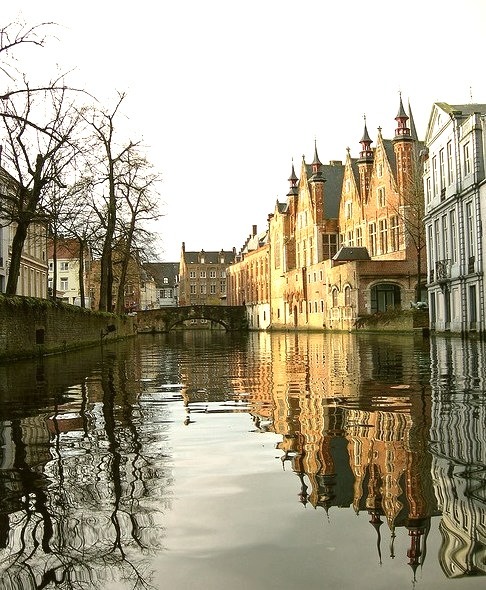 Reflections on the canals of Bruges, Belgium