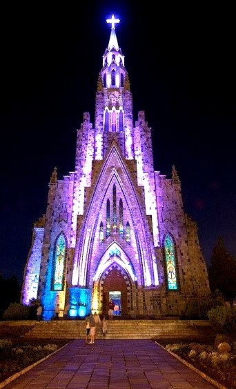 Nossa Senhora de Lourdes Cathedral glowing in the night, Canela, Brazil